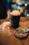 Black glass with ice, cold crystals on bar counter