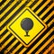 Black Golf ball on tee icon isolated on yellow background. Warning sign. Vector Illustration