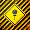 Black Golf ball on tee icon isolated on yellow background. Warning sign. Vector Illustration