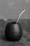 Black gourd with sipped metal straw best use for Yerba Mate tea