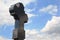 Black granite cross on cemetery