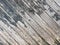 Black gray old rustic wooden background. Shabby timber board. Close up of wall made of diagonal wood planks