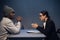 A black guy listens to his rights from a civil lawyer at a table in a visiting room in a state prison