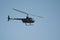 Black Helicopter in Sky