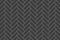 Black herringbone metro tile seamless pattern. Subway stone or ceramic brick wall background. Kitchen apron or bathroom