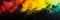 Black history month background. Colored powder explosion. Explosive splash red, yellow, green color powder dusk on black