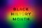 Black History Month inscription on colorful blurred background.