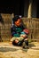 Black Hmong woman breastfeed her baby in Sapa Valley Vietnam