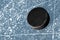 Black hockey puck