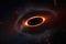 black hole surrounded by glowing ring of material being pulled into its event horizon