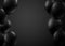 Black holiday background with balloons. Holiday decoration.