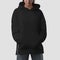 Black hoodie mockup with side slits on a girl with hands in pockets, front view closeup, product photography for design, brand