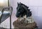 Black horse head, rusted horseshoes and an old ash tray outside Cactus Liquors in Marfa, Texas.