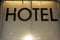 Black Hotel font with snow falling down