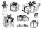 Black Ink Grunge Hand Drawing of Set of Wrapped Christmas Gift Boxes