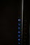 Black internet modem with blue light buttons
