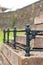 Black iron floral curved fence. Graveyard of Stirling castle.