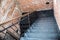 black iron staircase brick wall, creative space. loft office. coworking