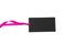 Black isolated recycle tag with pink satin ribbon top view on a white background