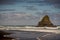 Black Karekare Beach with the Watchman Rock.