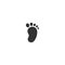 Black kids or baby feet and foot step. New born, pregnant or coming soon child footprints