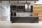 Black kitchen counter, wood and concrete