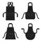 Black kitchens aprons of different shapes with pockets. Professional uniform for chef. Protective accessory