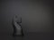 Black knight chess figurine on dark background