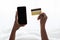 Black lady hands holding cellphone and credit card