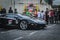 Black Lamborghini Aventador LP700-4 driving slow