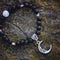 Black lava stone moon pendant bracelet