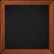 Black leather background in wooden brown frame