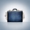 Black leather briefcase overflowing with plans, reports, and paperwork. Intellectual property and data