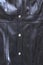 Black leather fashion jacket texture and silver metallic button