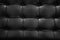 Black leather sofa texture in royal style. Elegant embossed black leather pattern. Vintage style and geometry pattern.