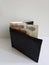 black leather wallet with russian banknotes and white background