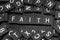 Black letter tiles spelling the word & x22;faith& x22;