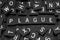 Black letter tiles spelling the word & x22;plague& x22;
