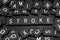Black letter tiles spelling the word & x22;stroke& x22;