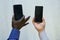 Black lives matter. Afroamerican and european hands holding phones close together