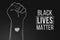 Black Lives Matter protest in USA. Riot poster. Stop violence to black people. Fist symbol with heart on a dark background. Hand