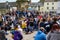 Black Lives Matter protesters kneeling on the cobbles of Richmond Marketplace while angry Counter protesters watch and jeer