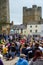 Black Lives Matter protesters kneeling on the cobbles of Richmond Marketplace in front of Richmond Castle, while angry Counter