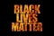 Black Lives Matter text written with flaming types on black background.