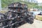 Black lobster pots on harbour quay