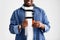 Black male hands holding construction tool clamp, ready for repairs at home, standing on white wall studio background