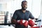 Black man, boxer and portrait for fitness, training or exercise workout ready for fight at gym. African fighter, boxing