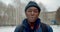 Black man breathe mouth cold frost close up looking at camera american face 4K.