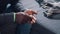 Black man counting coins. Close up on the hands of poor man