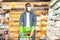 Black Man In Face Mask Shopping Groceries In Supermarket Store